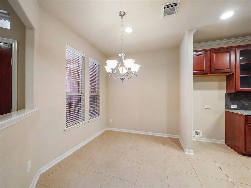 Formal dining adjacent to kitchen