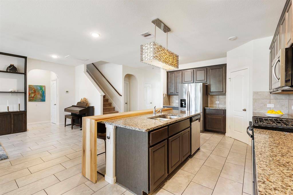 Another view of the kitchen from the dining area.