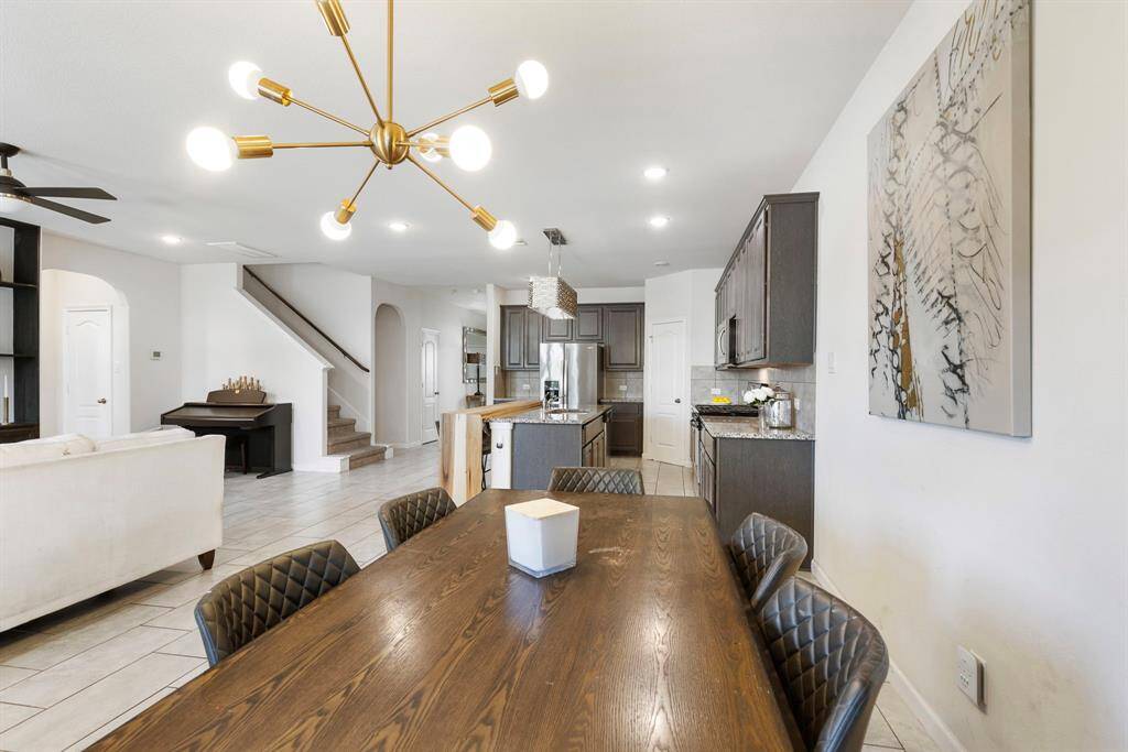 Another view of the dining area overlooking the open kitchen & living area.