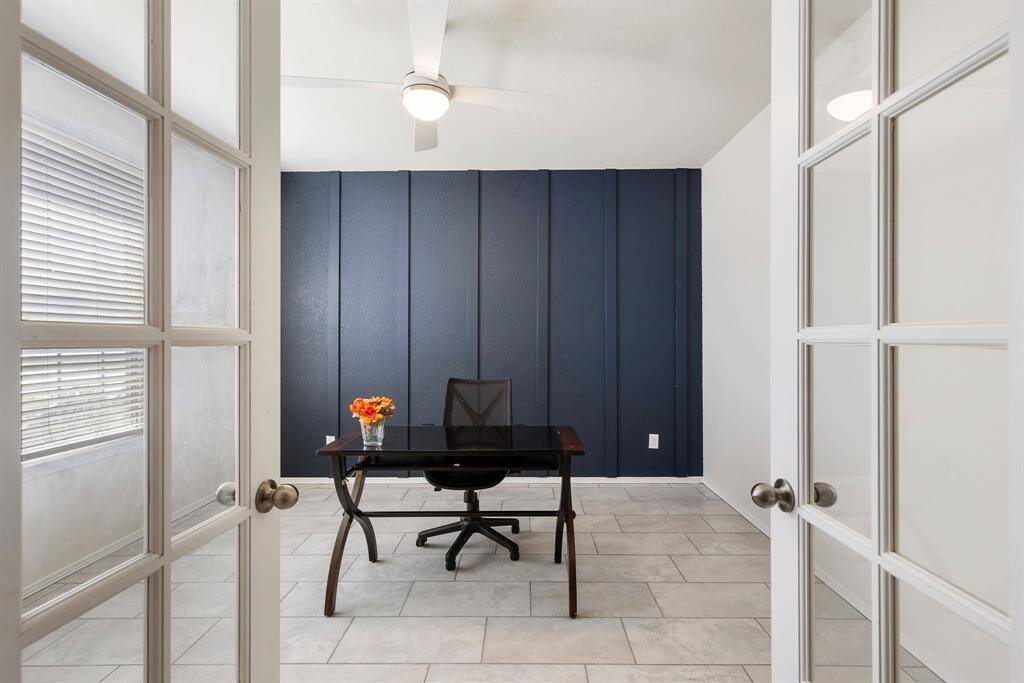 Spacious home office is located at the left as you enter the house.