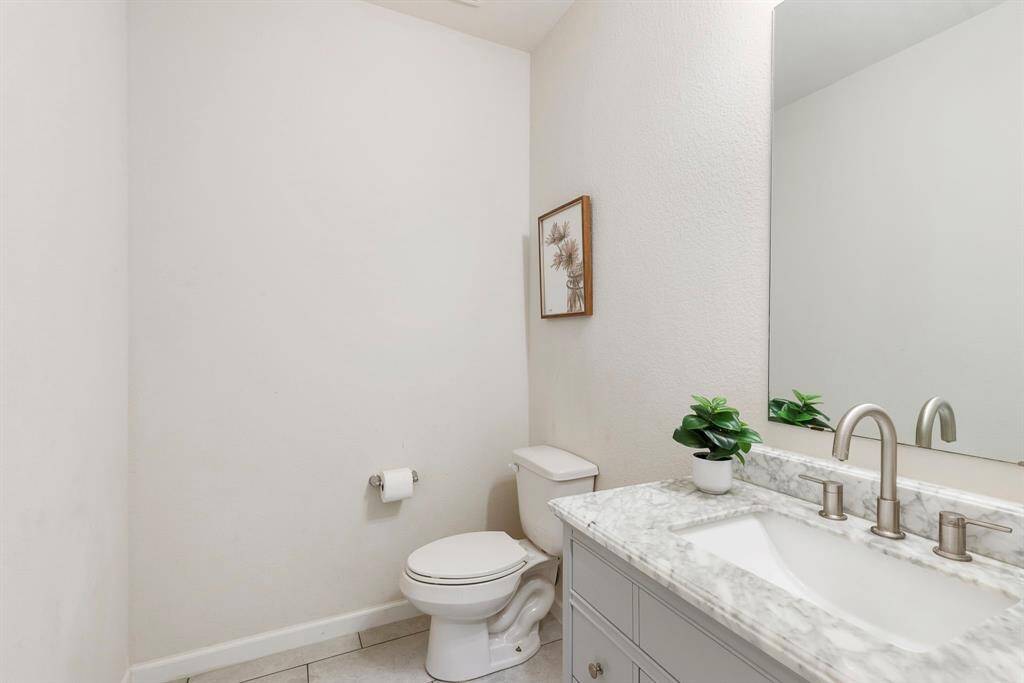 Adorable powder bath with upgraded vanity & faucet.
