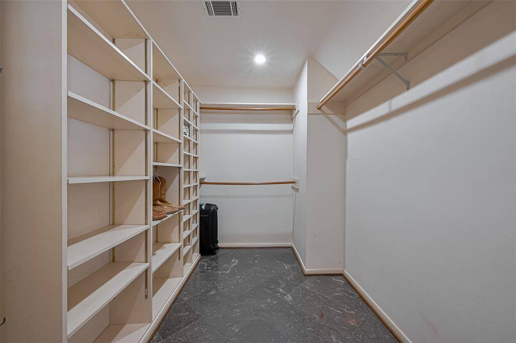 Large walk-in closet within the primary bath.