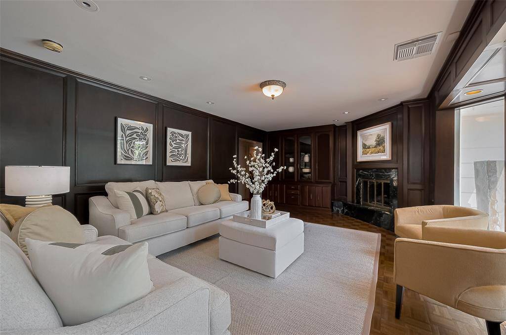 Living room has classic moldings.
