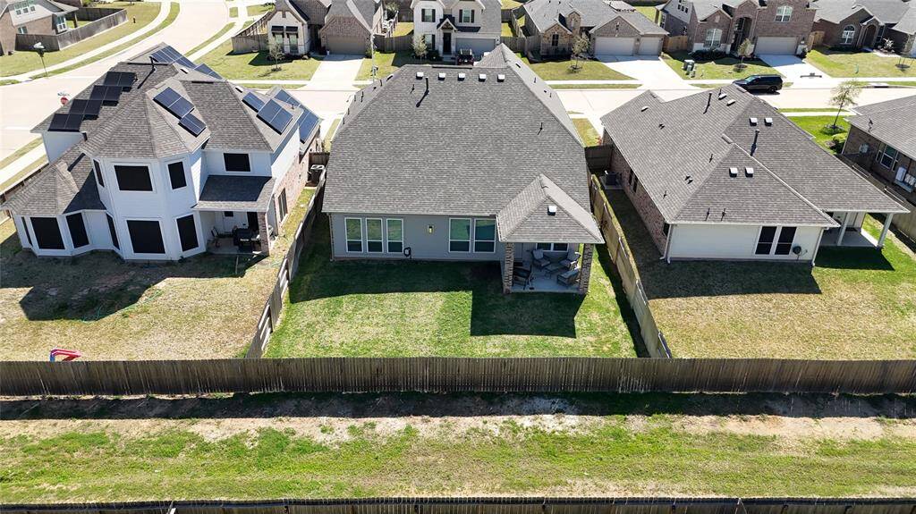 The greenbelt behind the backyard provides added privacy for entertaining and enjoying the backyard