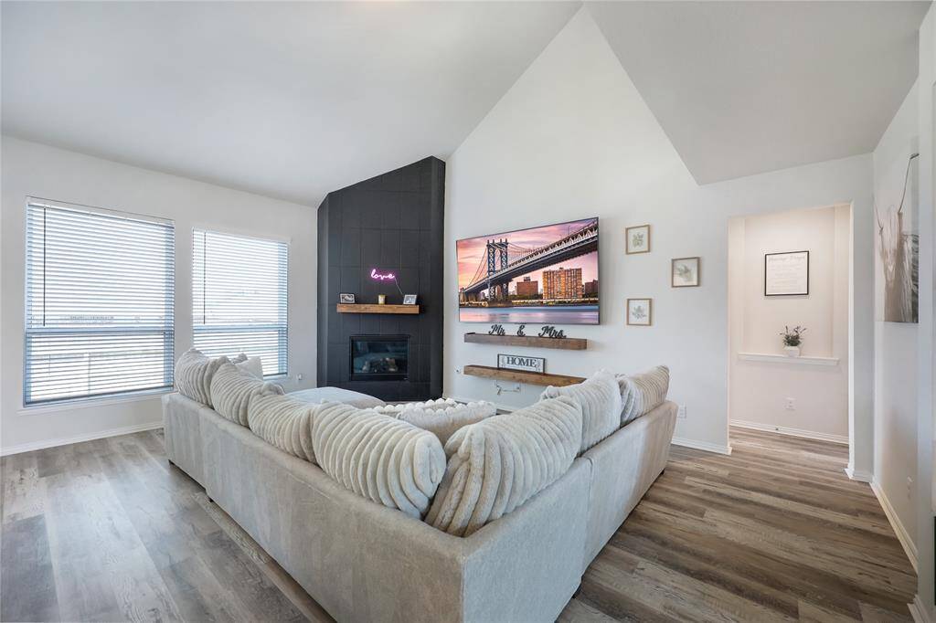 A secluded entry from the living room leads to the large primary suite for added privacy.