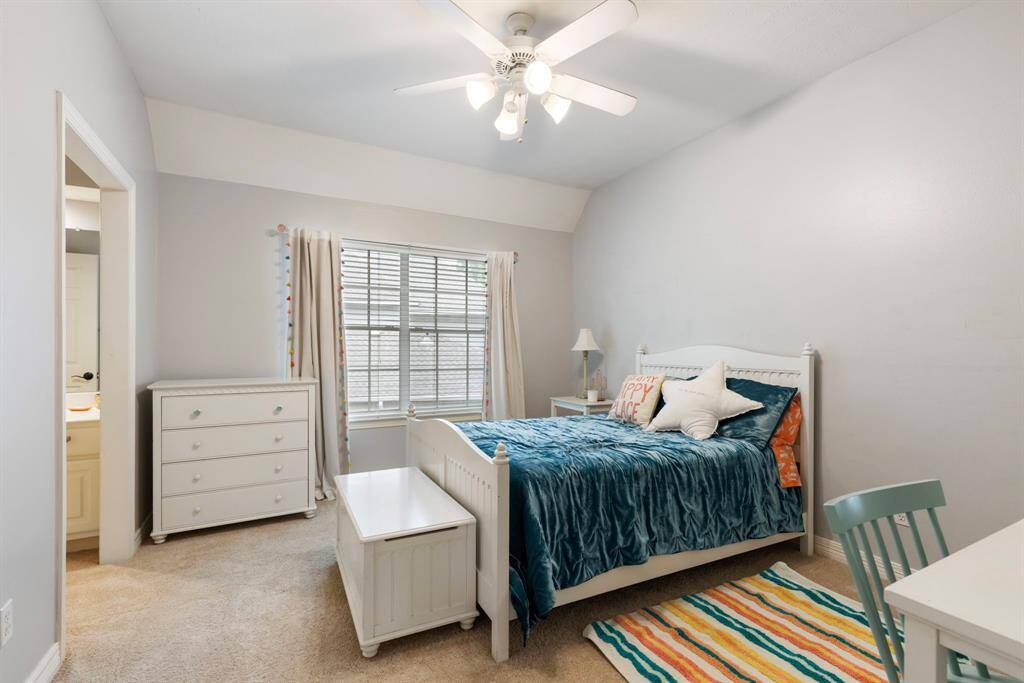 This secondary bedroom shares a Jack-and-Jill bathroom.
