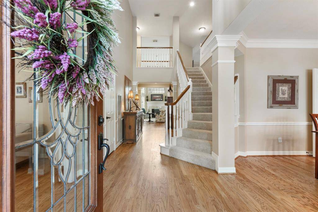 Welcoming entrance with beautiful hardwood flooring throughout.