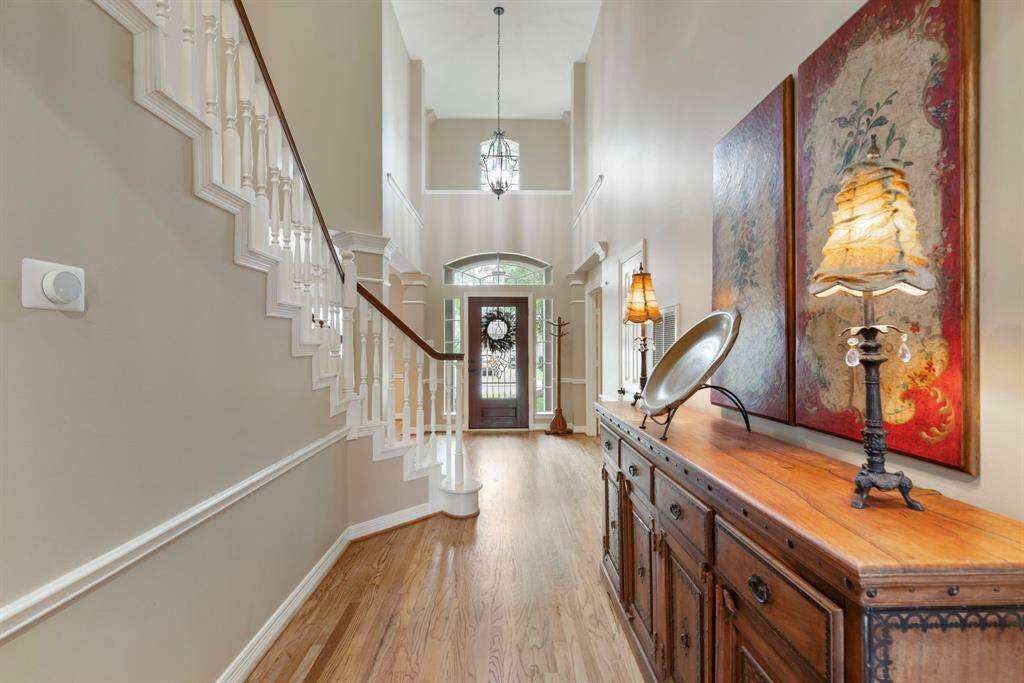 High ceilings and large windows fill the space with natural light.