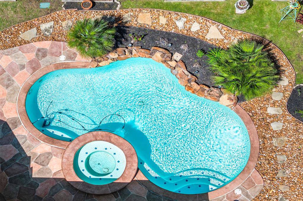 Dive into luxury with this stunning pool, perfect for outdoor entertaining and relaxation.