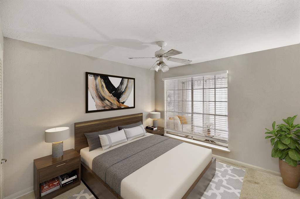 Virtually Staged: Beautiful secondary bedroom complete with carpet floors, crown molding, and a ceiling fan.
