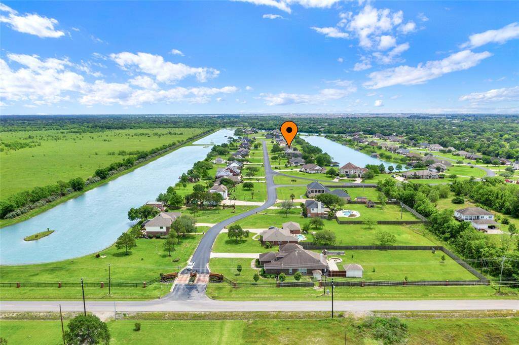 Lago Santa Fe is a vibrant, gated community featuring a scenic 1-mile circle road, perfect for active living.