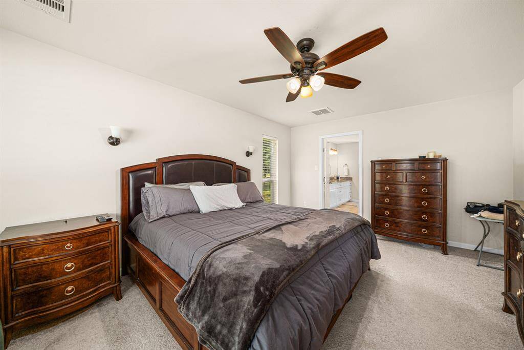 Master suite is roomy and has lots of space.
