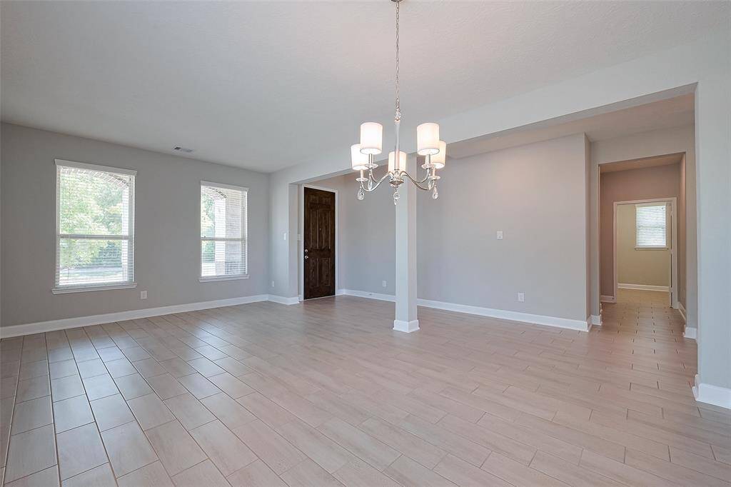 Large dining area or additional living space as you enter the home.