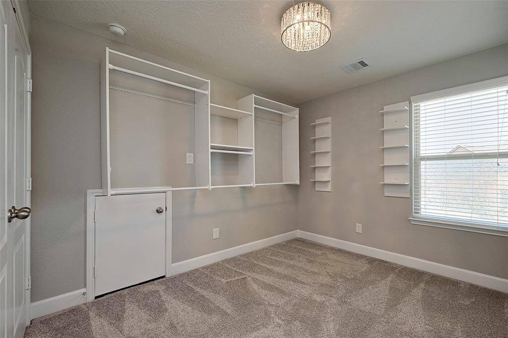 Bedroom 2 (was used as a closet so it has lots of really neat storage)