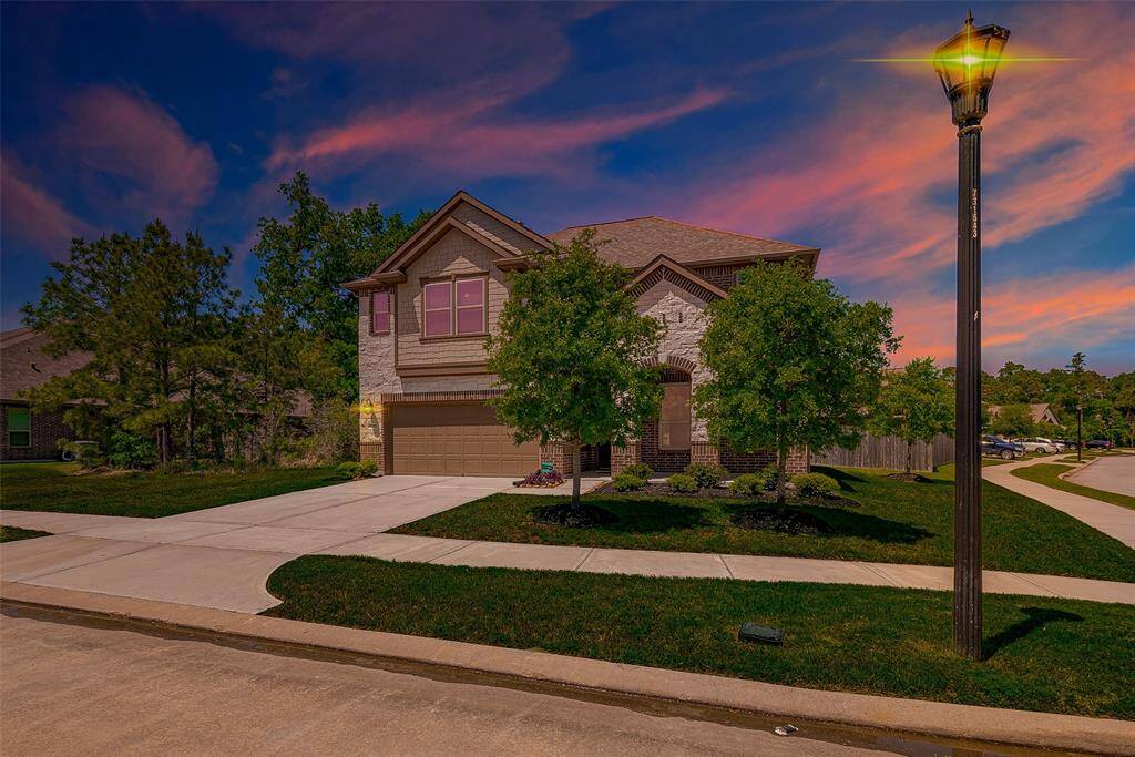 Virtual Twilight highlighting the beautiful curb appeal of this home.