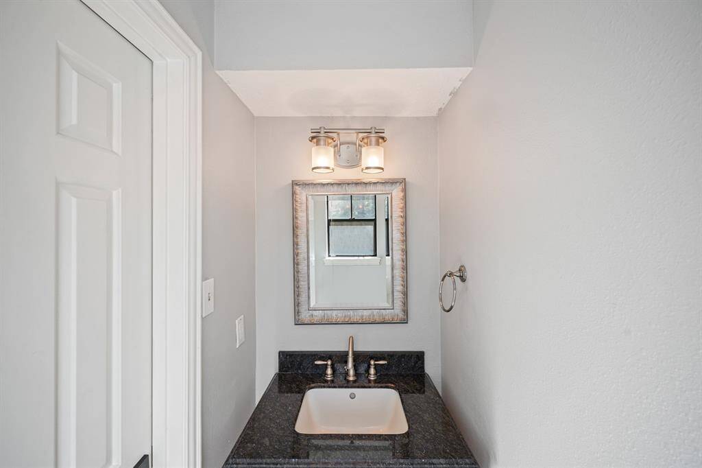 This well-appointed half bathroom is great for when you have family, friends, and guests over.