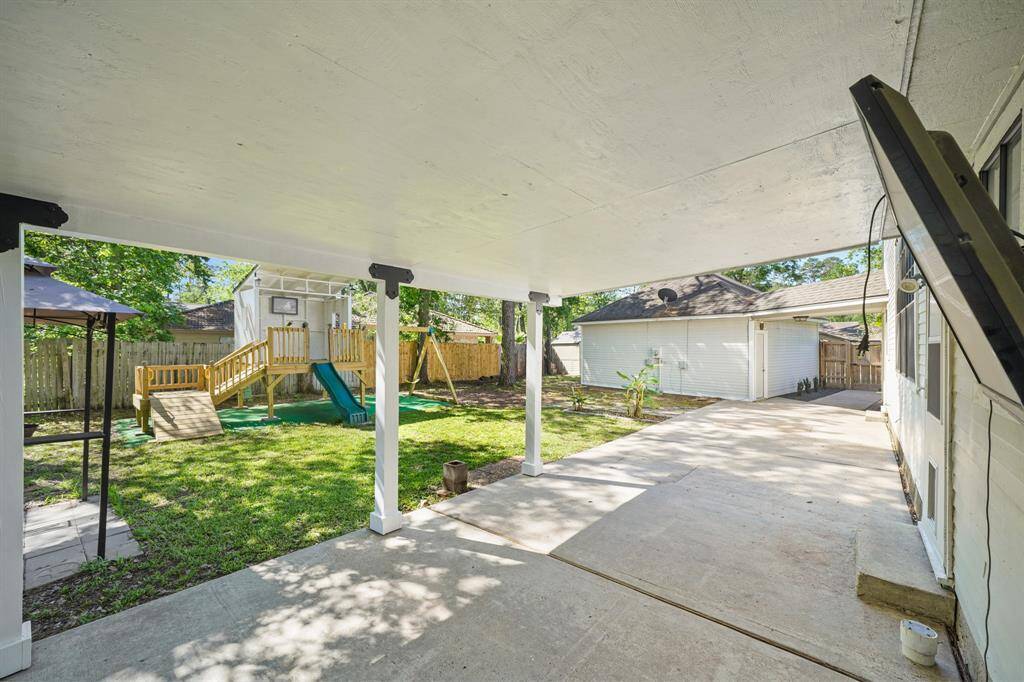 Kick back and relax on the covered backyard patio.