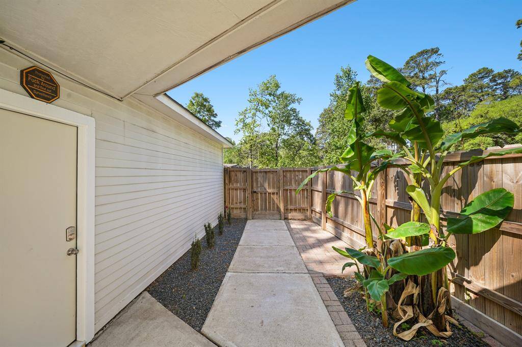 Easy access to the backyard from the garage which includes a covered walkway that will protect you from the rain.