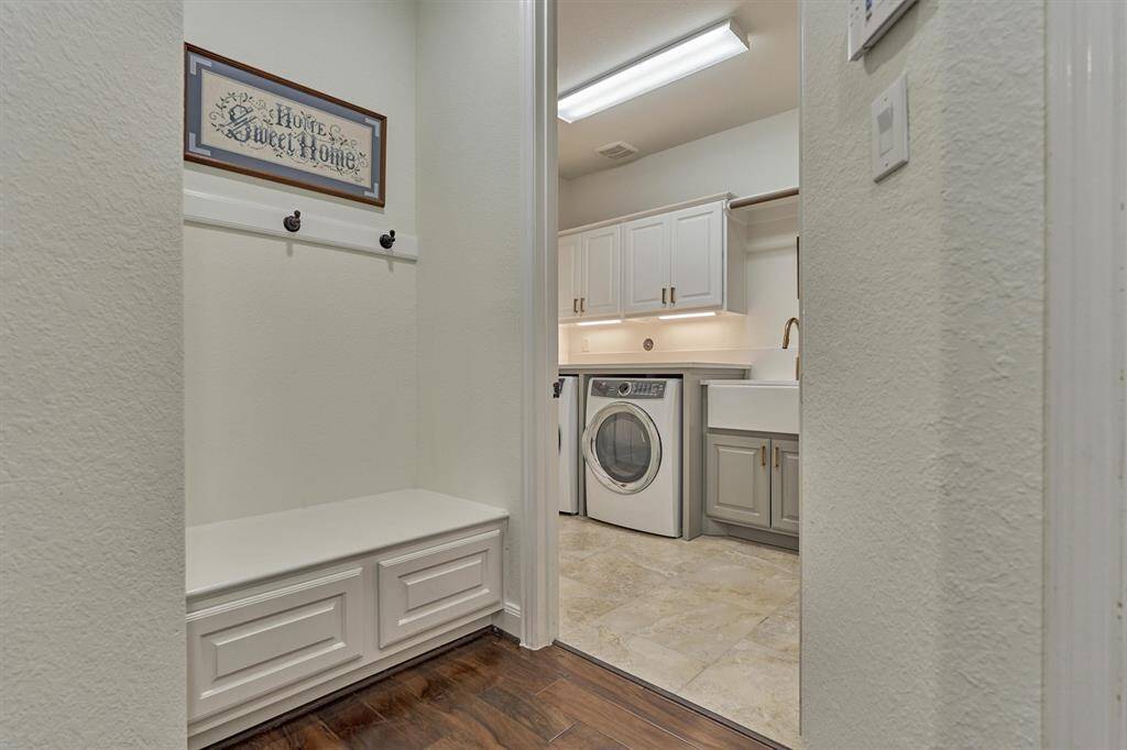 Mud Room & Utility conveniently located by garage entry