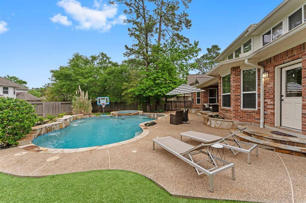 This outdoor oasis is perfect for unwinding! Lounge while waiting on the grill, sipping a cold beverage, and soaking in breathtaking sunsets. After a long day, retreat to your private covered patio, listen to the soothing waterfall features, relax in the hot tub, or take a refreshing swim.