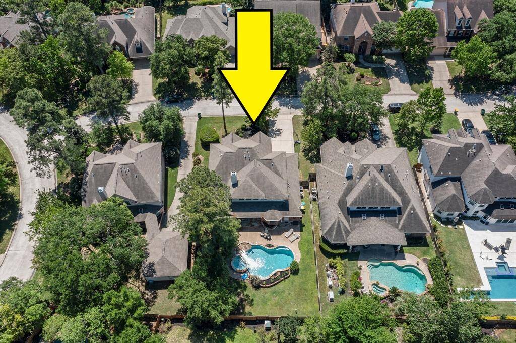 This magnificently designed and exceptionally well built two-story home in the Sterling Ridge neighborhood of The Woodlands is ready for you to make it yours! This stunning home is perfectly placed on over one third of an acre and is well maintained and manicured. Click on the movie reel icon to see our video. At the end is a Google flyover, so you can see how close this home is to shopping, schools, hospital, the airport, and downtown!