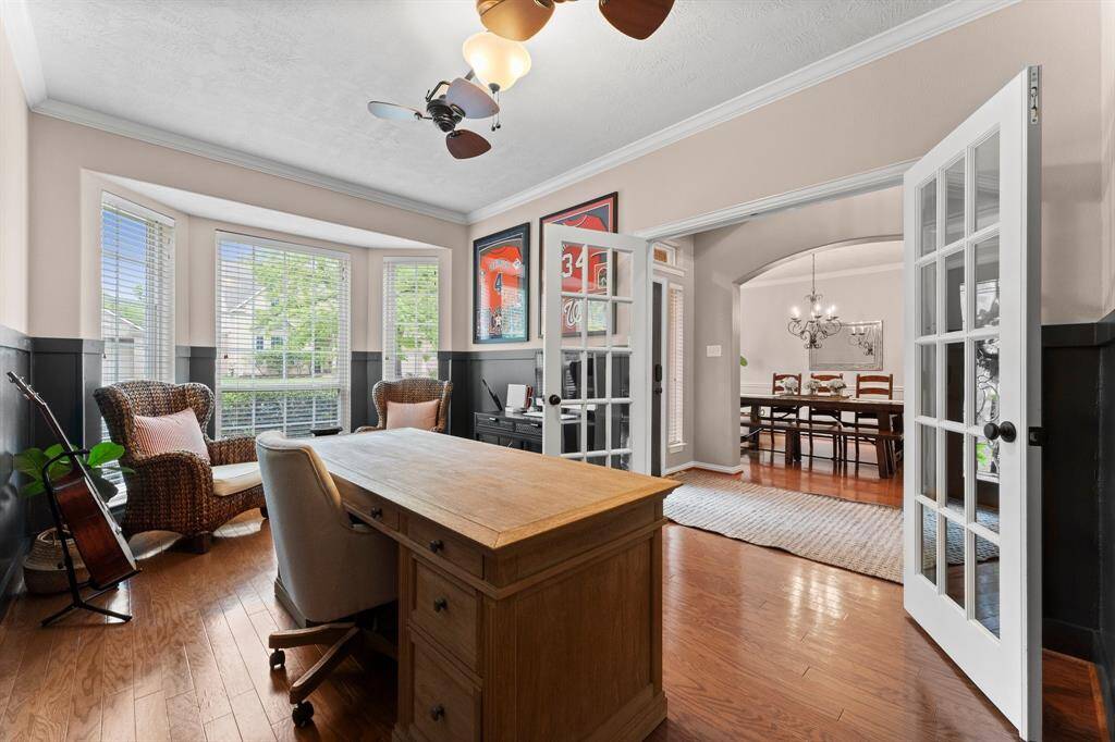 Another view of the study.  Glass-front French doors provide the privacy and sound control you need at times while still letting you view the activities within the home.