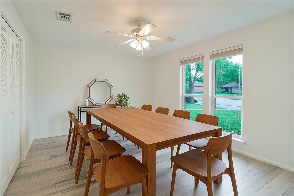 Formal dining area right next to the kitchen can easily fit a 8-seat dining tables and gets ample natural lighting. Virtually staged