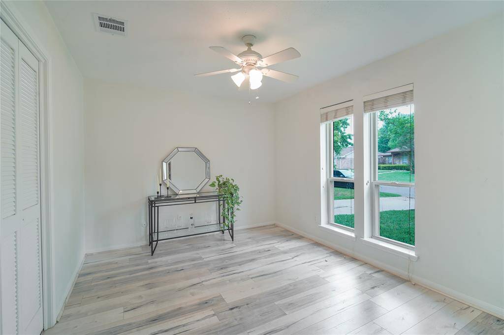 Formal dining area right next to the kitchen can easily fit a 8-seat dining tables and gets ample natural lighting.