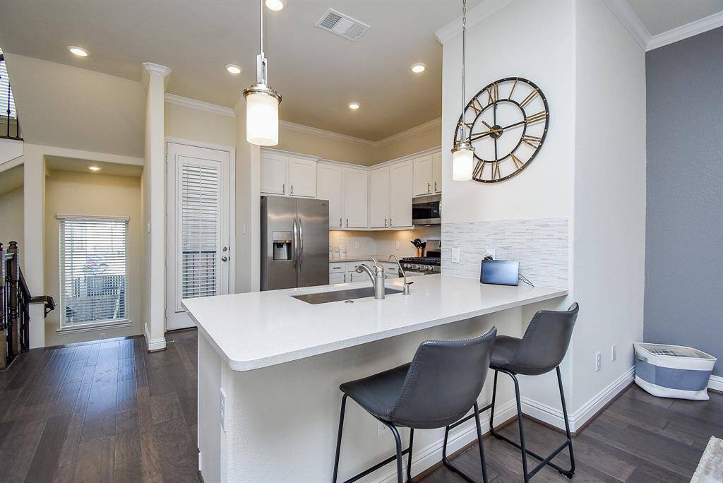 Note balcony off the kitchen.