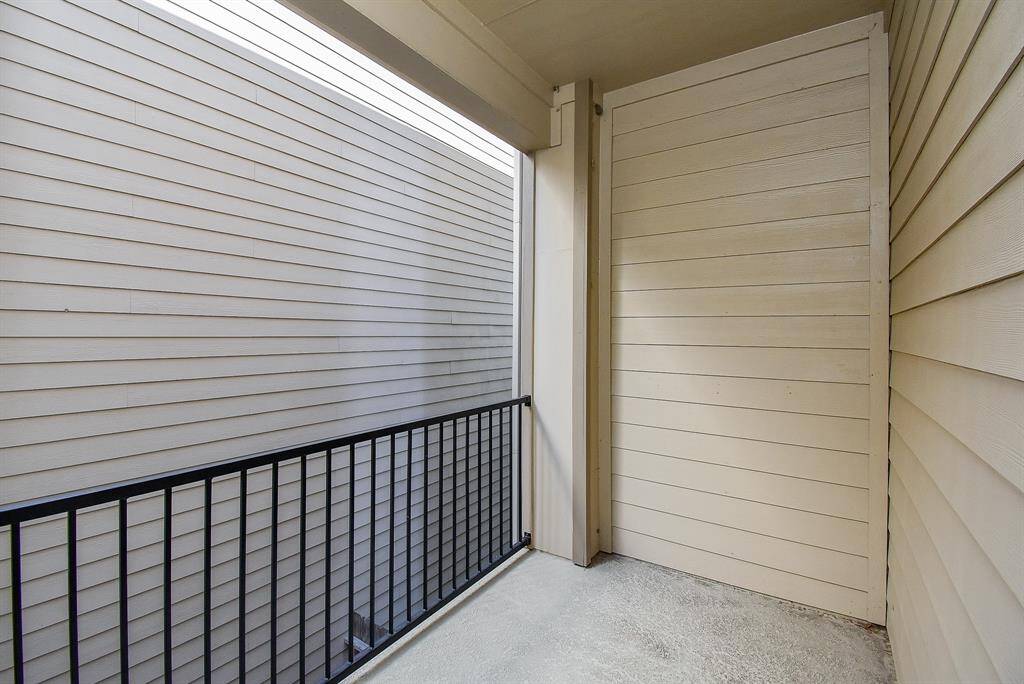Balcony accessible from kitchen.