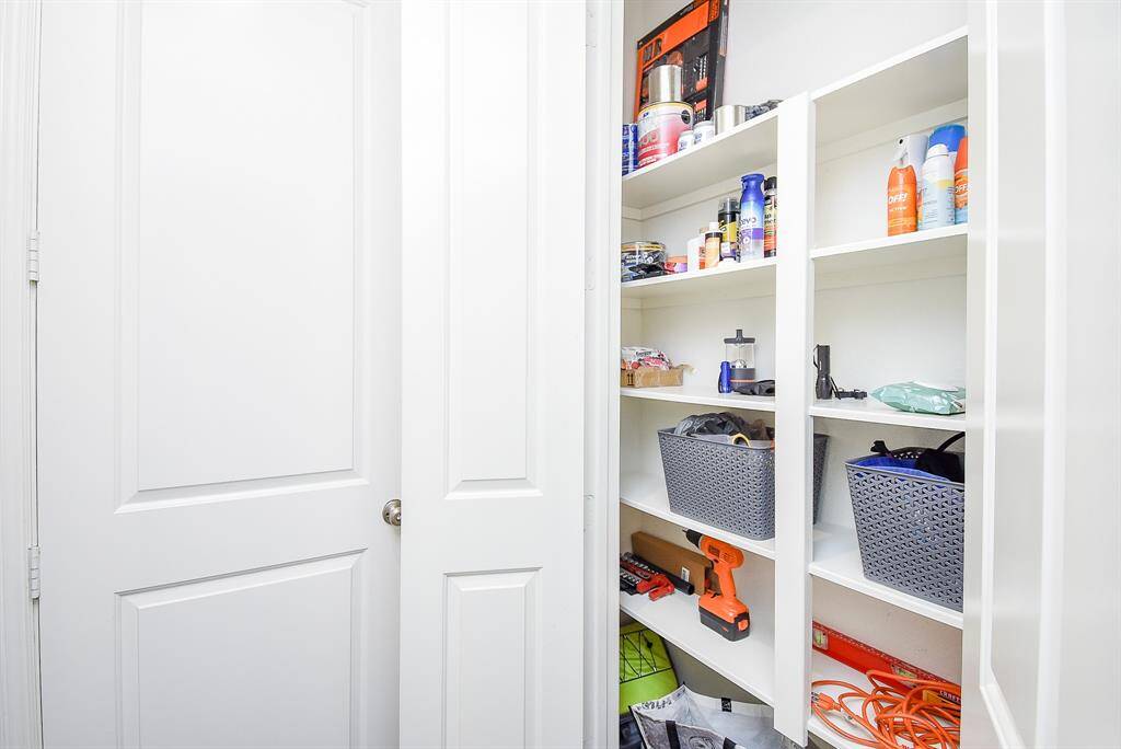 Downstairs features tons of storage in two large closets, conveniently off front door entry and garage entry.