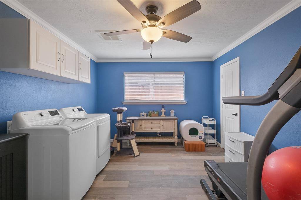 Spacious laundry room with closet, easy conversion back to a bedroom or flex space!