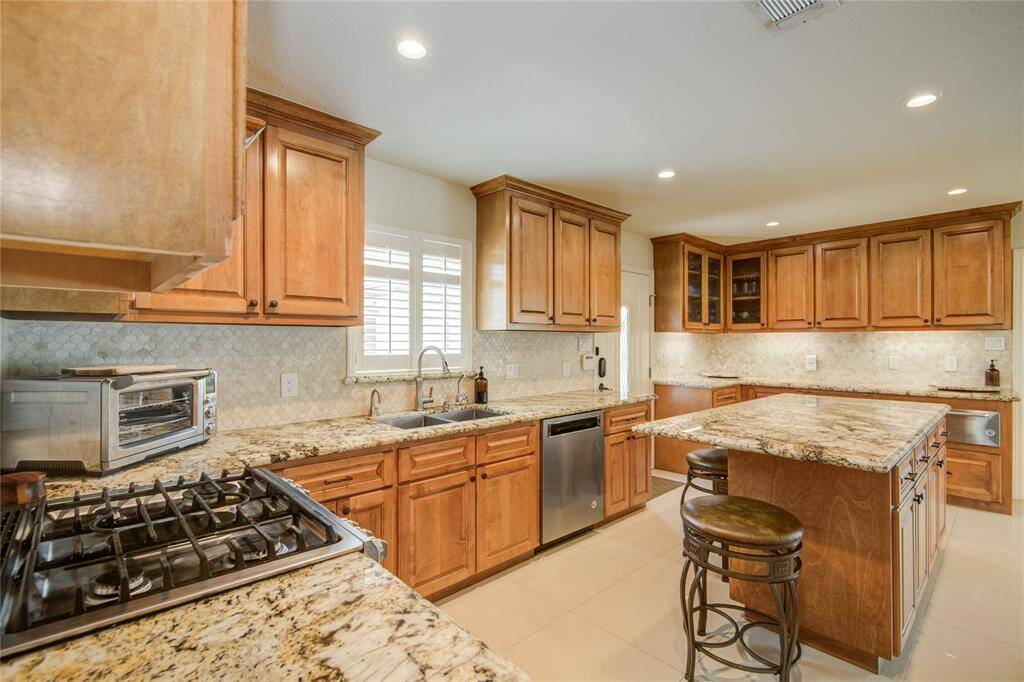 Along with brand new cabinets and modern furnishes includes a unique built in warming drawer.