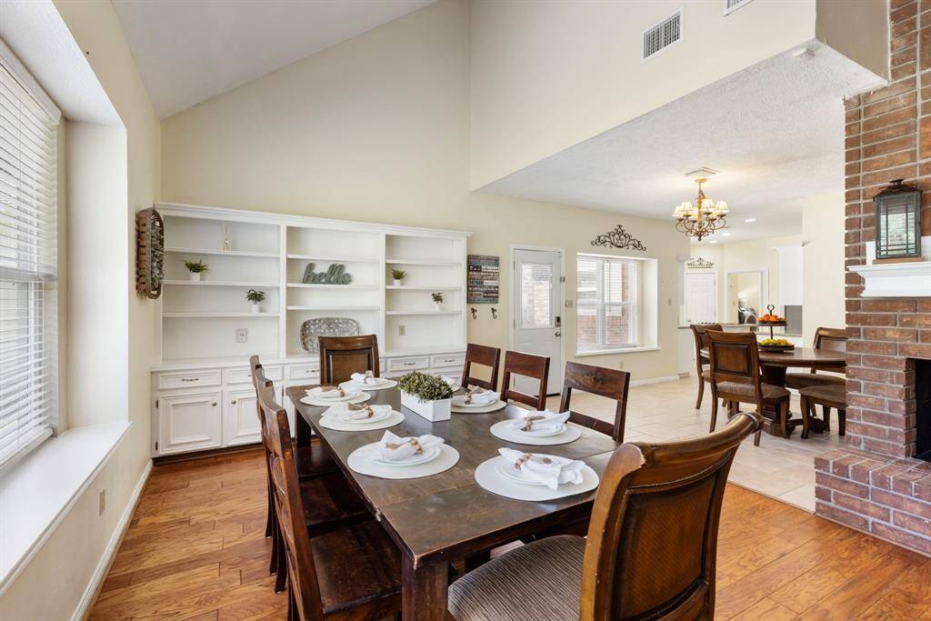 Another perspective of this open and versatile space, showcasing the built-ins that are perfect for storing and displaying dishes, school supplies, or anything else you need to keep organized and within reach.