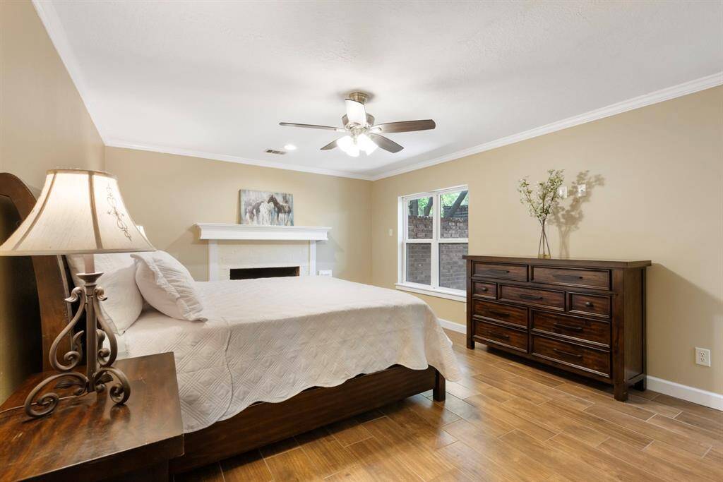 Relax in the very spacious yet cozy primary bedroom, complete with a fireplace and private courtyard!