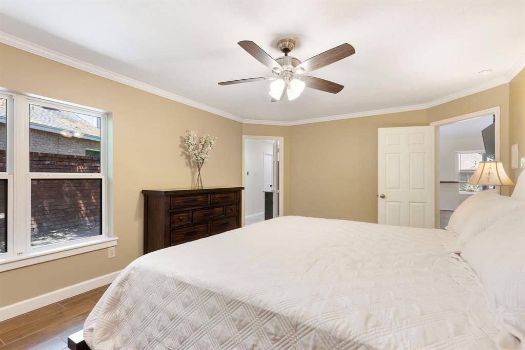 The primary bedroom is conveniently located on the first floor for easy access and privacy.