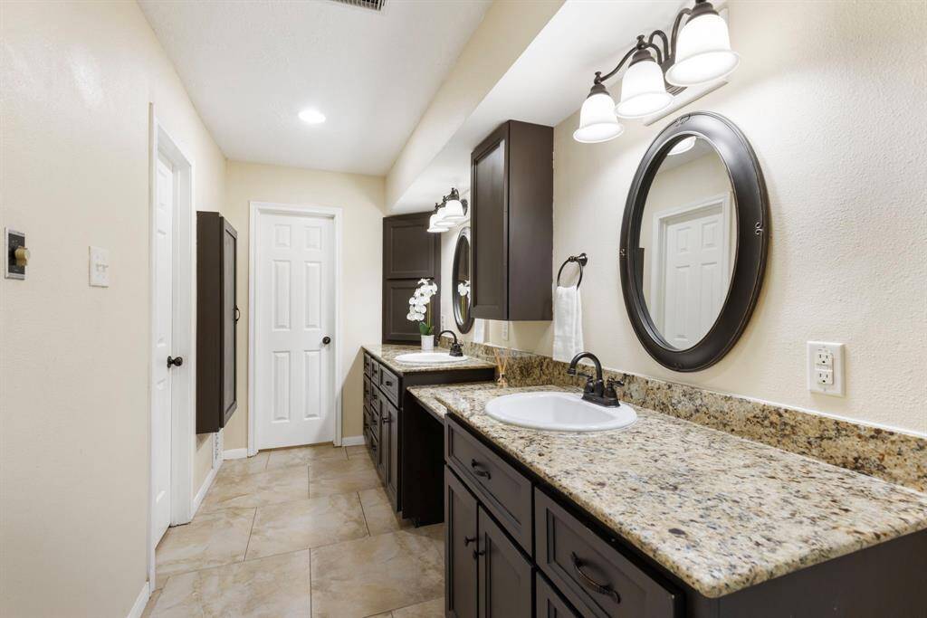 This space also offers a vanity, perfect for getting ready in the mornings.
