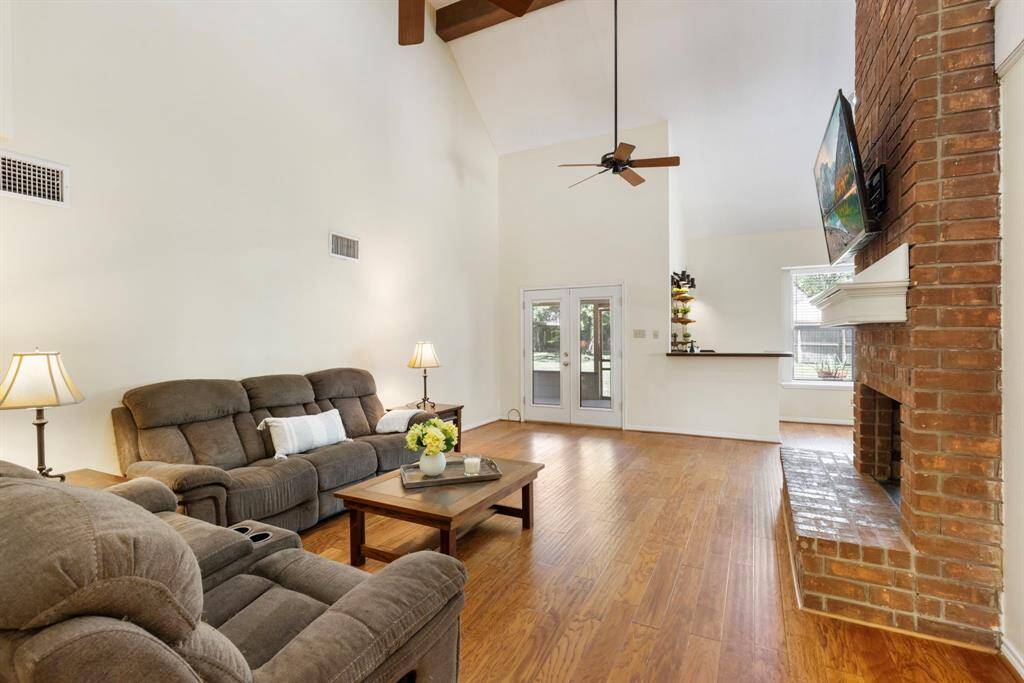 Sure! Here’s an upgraded version:The soaring ceilings, abundant natural light, and expansive living room create an incredible sense of space and openness. It’s the perfect blend of airy elegance and comfort.