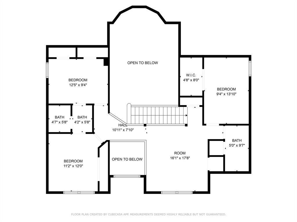This floor plan features three bedrooms, three bathrooms, and a walk-in closet (W.I.C.). It includes a spacious central room, a hall, and two open areas overlooking the lower level, providing a bright and airy feel. Ideal for comfortable family living.