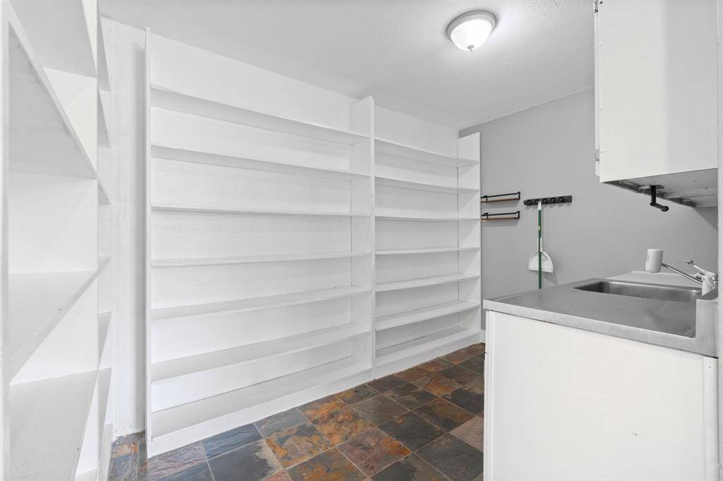 Large walk in pantry with extra dishwasher and sink