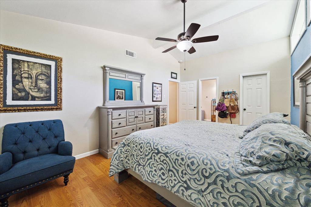 Great sized primary with laminate wood flooring and not shown a walk-in closet.