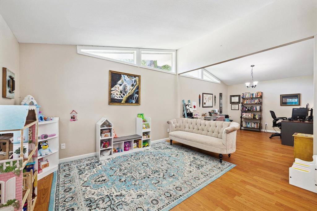 Separate living space currently being used a play room.