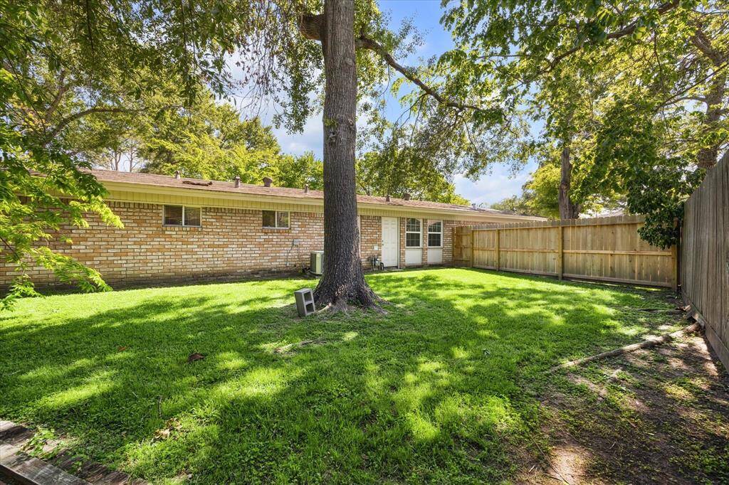 Yard space provided on the other side of the home - all fully fenced in.