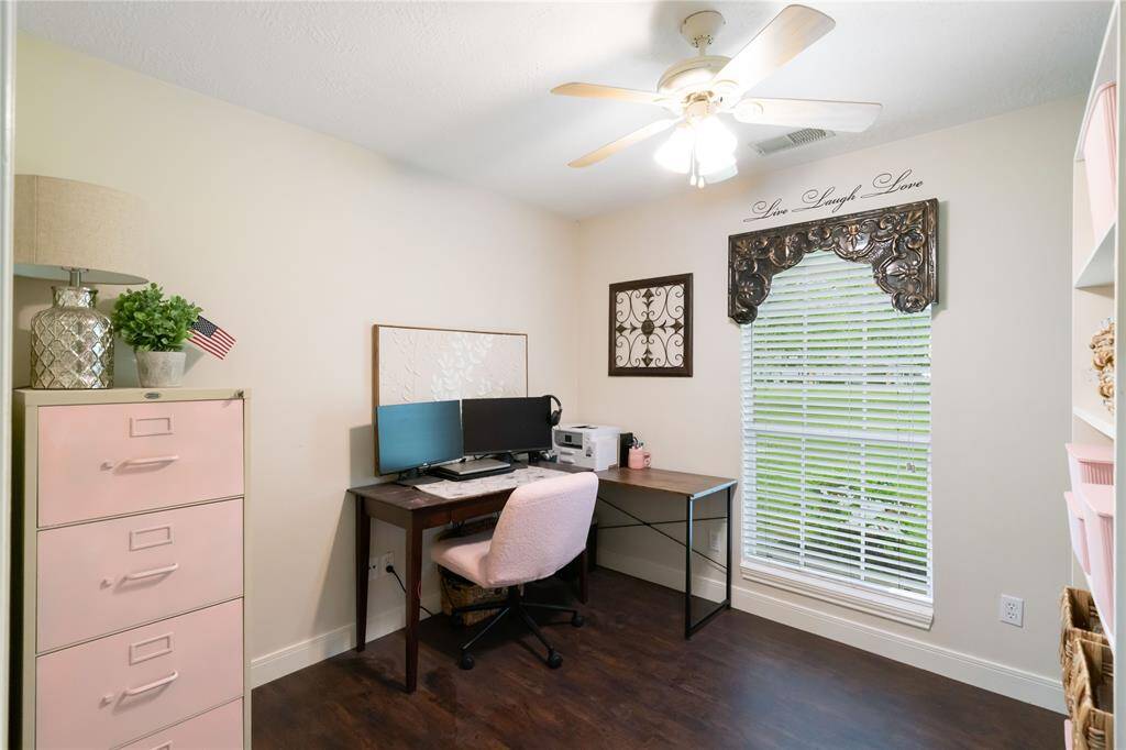 Just off the kitchen is a bonus nook currently used as a home office. It also offers great potential for a butler’s pantry, coffee bar, or additional storage space.