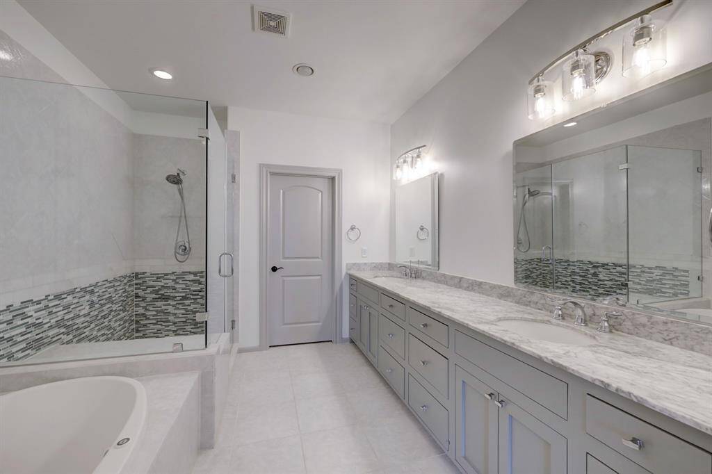 Amazing primary bath.  Not shown, 2 walk-in closets.