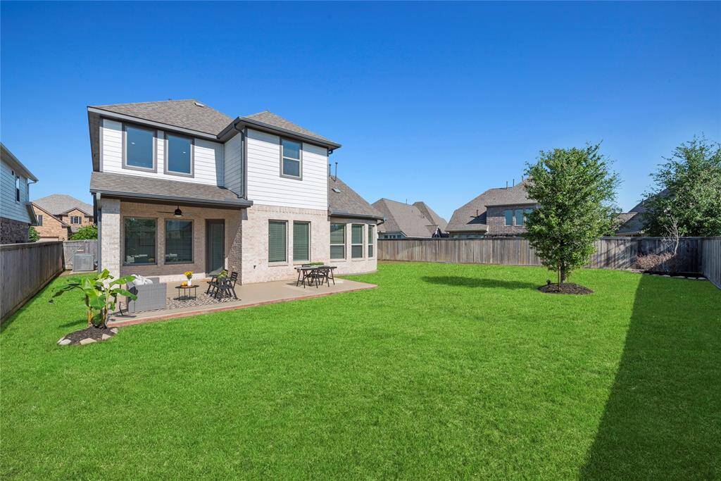 Spacious backyard with endless possibilities