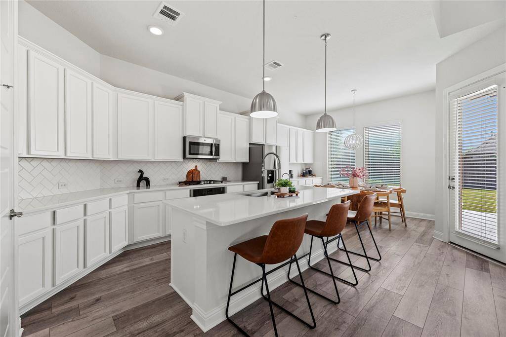 Beautiful natural light comes in through all the windows in your kitchen area