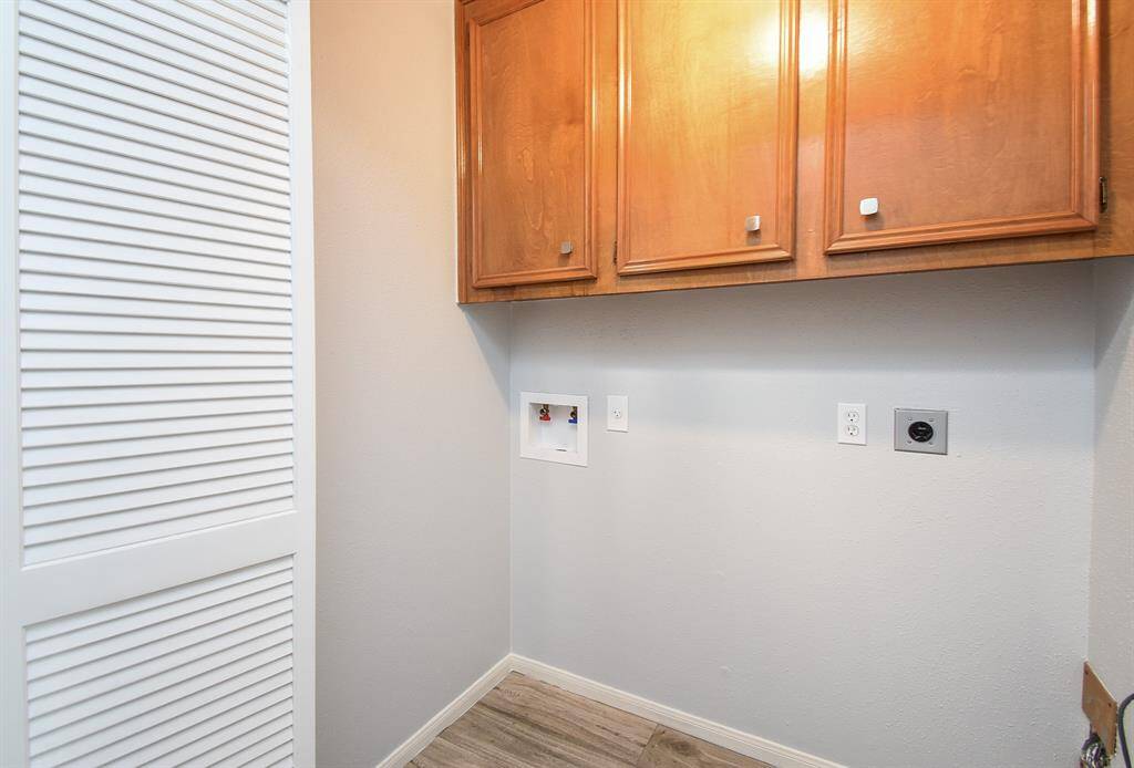 Laundry with cabinets