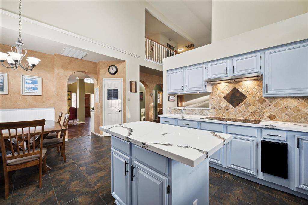 This home is so open and inviting, and a perfect spot for entertaining large groups. And yes, there is GAS COOKING on the high-end cooktop.