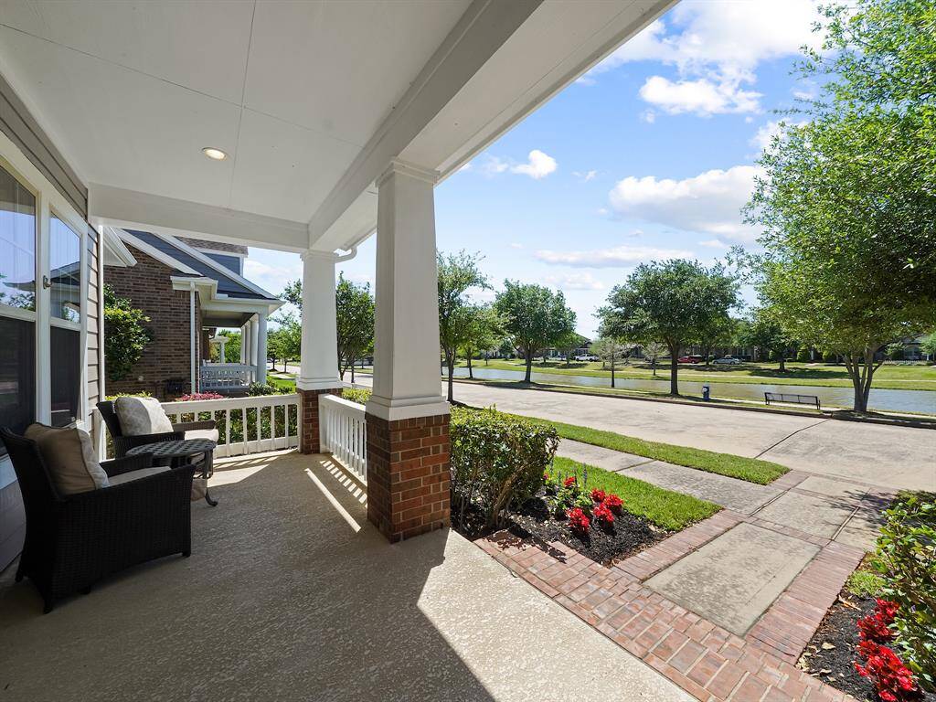 The porch is a perfect place to enjoy your morning coffee while enjoying the views of one of the many water ways in Bridgeland.
